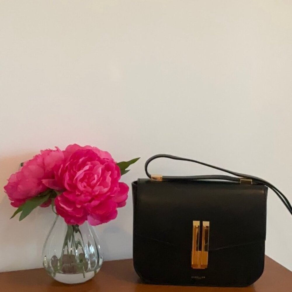 Demellier black smooth bag